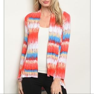Coral red multi colored open front cardigan.